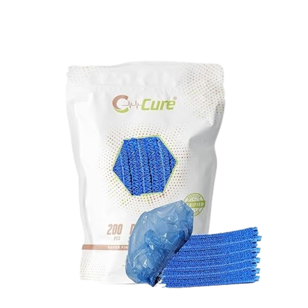 A pack of C-CURE brand disposable waterproof shower caps, with one cap displayed in front of the package.