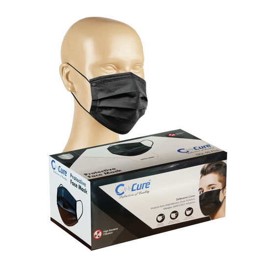 Black face mask on a mannequin head with C-cure packaging