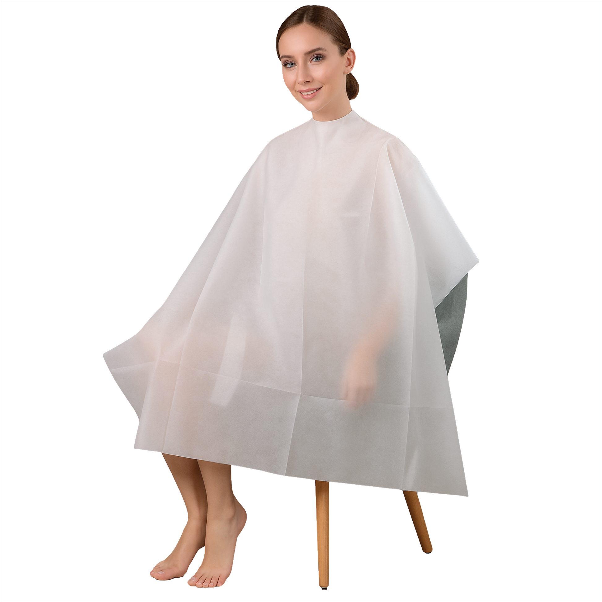 Woman wearing a white hairdressing cape or salon apron white 