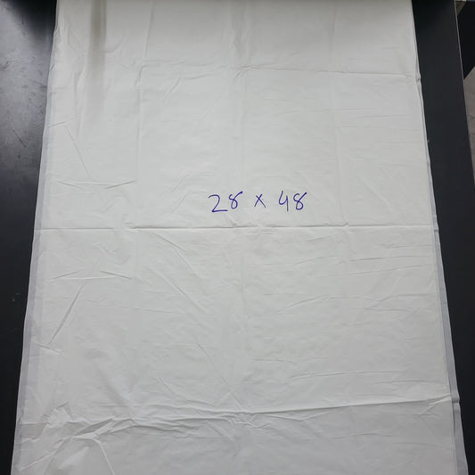 White Compostable liner bag with dimensions 28 x 48. 