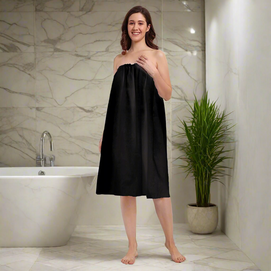 Woman wearing a leios black spa gown 