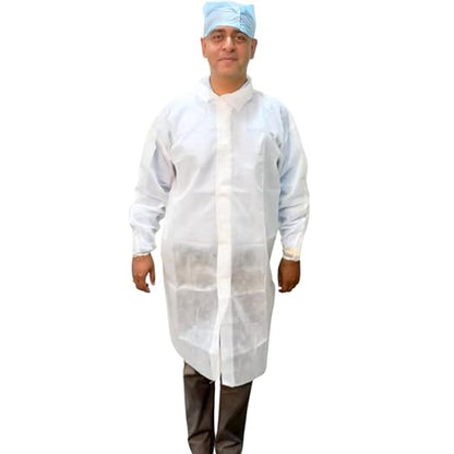 A person wearing a white disposable non-woven lab coat with long sleeves, elastic wrists, and without pockets,